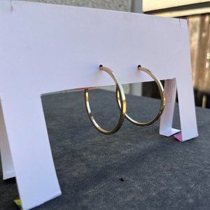 Thick gold hoop earrings